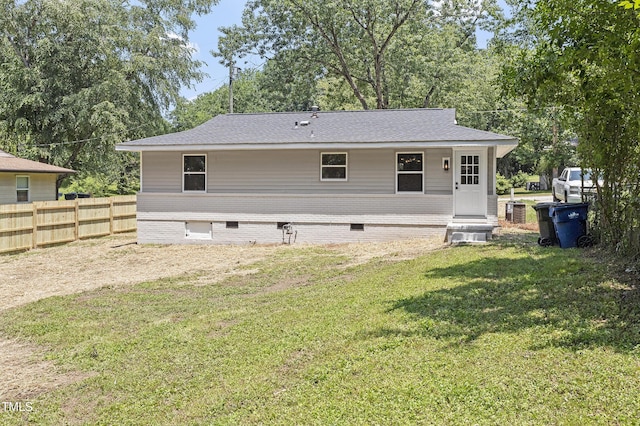 768 Lunar Dr, Raleigh, NC 27610 - back of property featuring crawl space and a shingled roof