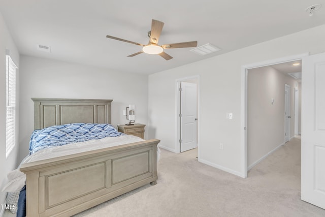 4949 Microcline Trl, Raleigh, NC 27610 - bedroom with light carpet and ceiling fan