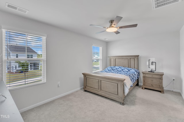4949 Microcline Trl, Raleigh, NC 27610 - bedroom with light carpet and ceiling fan