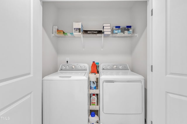 4949 Microcline Trl, Raleigh, NC 27610 - laundry area with washing machine and clothes dryer