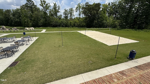 4949 Microcline Trl, Raleigh, NC 27610 - surrounding community featuring volleyball court and a lawn