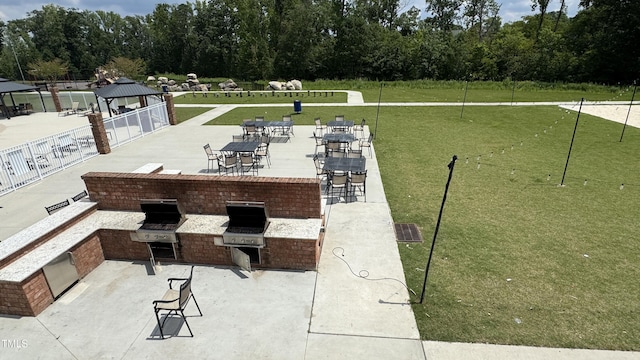 4949 Microcline Trl, Raleigh, NC 27610 - surrounding community featuring a gazebo and area for grilling