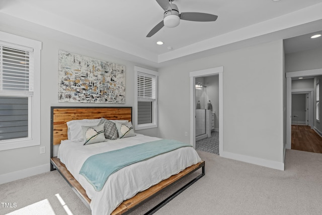 409 S Tunstall Ave, Apex, NC 27502 - carpeted bedroom with recessed lighting, connected bathroom, and ceiling fan