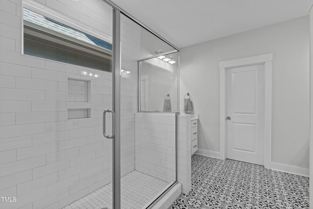 409 S Tunstall Ave, Apex, NC 27502 - bathroom featuring a shower stall and baseboards