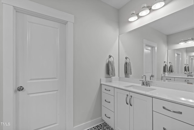 409 S Tunstall Ave, Apex, NC 27502 - bathroom featuring vanity and baseboards