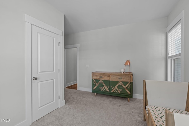 409 S Tunstall Ave, Apex, NC 27502 - carpeted bedroom featuring baseboards