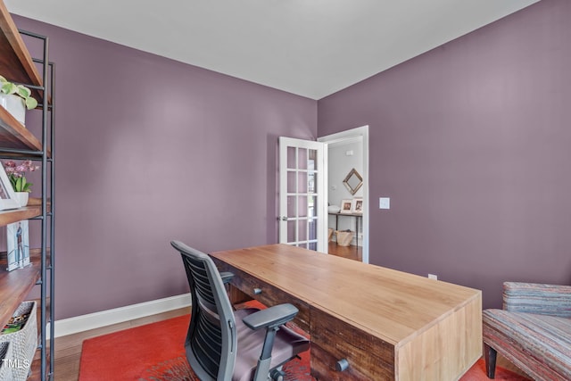 2716 Lake Waccamaw Trl, Apex, NC 27502 - office with baseboards and wood finished floors
