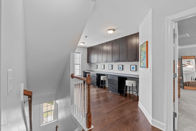 2716 Lake Waccamaw Trl, Apex, NC 27502 - hallway with an upstairs landing, dark wood finished floors, and healthy amount of natural light