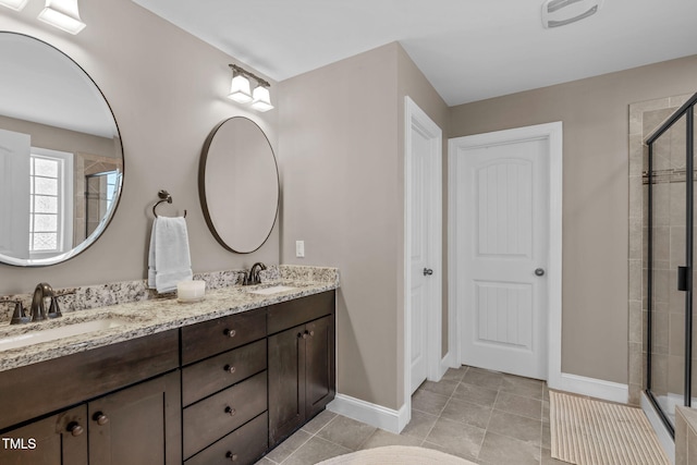2716 Lake Waccamaw Trl, Apex, NC 27502 - full bath with a shower stall, double vanity, and tile patterned flooring