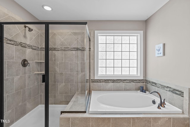 2716 Lake Waccamaw Trl, Apex, NC 27502 - bathroom featuring a garden tub, a stall shower, and recessed lighting