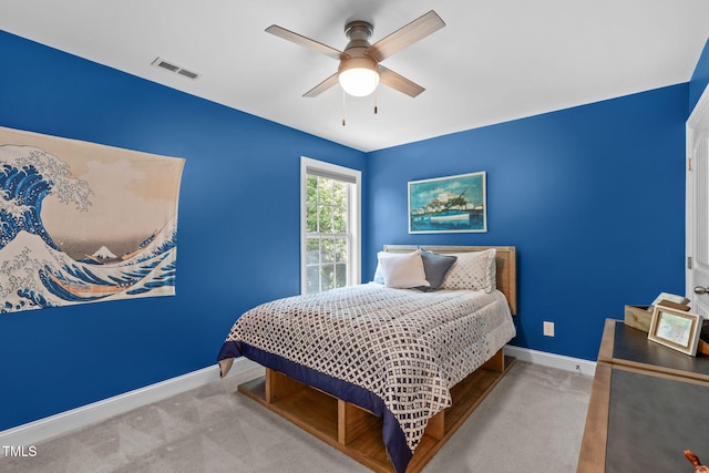 2716 Lake Waccamaw Trl, Apex, NC 27502 - carpeted bedroom featuring baseboards and a ceiling fan