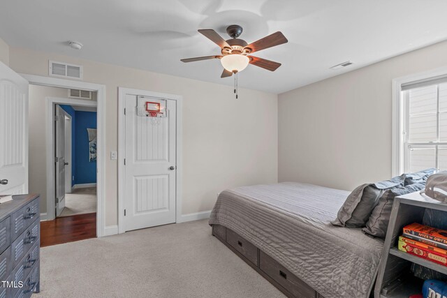 2716 Lake Waccamaw Trl, Apex, NC 27502 - bedroom with carpet floors and a ceiling fan
