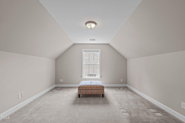 2716 Lake Waccamaw Trl, Apex, NC 27502 - additional living space with vaulted ceiling and carpet flooring