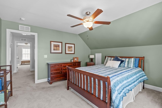 2716 Lake Waccamaw Trl, Apex, NC 27502 - bedroom with light colored carpet, ceiling fan, and lofted ceiling