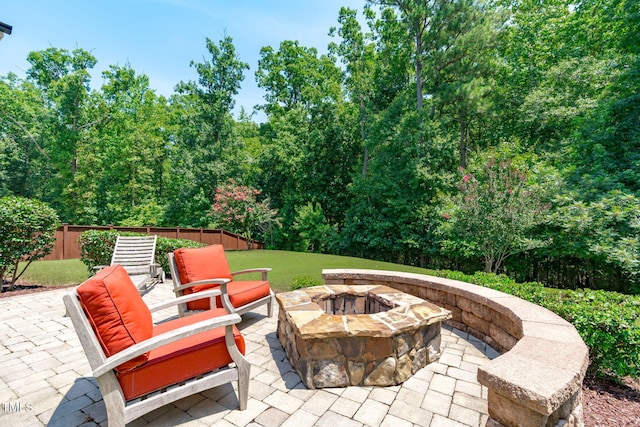 2716 Lake Waccamaw Trl, Apex, NC 27502 - view of patio with an outdoor fire pit