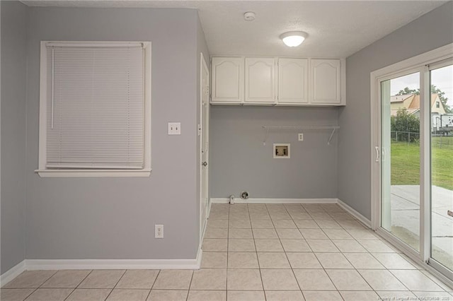 2408 Crabtree Ct, Fayetteville, NC 28304 - laundry room featuring washer hookup, gas dryer hookup, light tile patterned floors, and cabinet space
