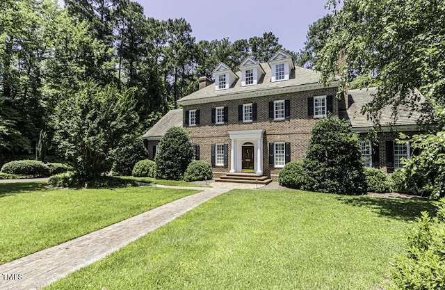 3112 Lake Pointe Trl, Rocky Mount, NC 27804 - colonial house with brick siding and a front yard