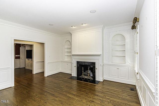 3112 Lake Pointe Trl, Rocky Mount, NC 27804 - unfurnished living room with built in shelves, a decorative wall, ornamental molding, a fireplace, and dark wood-type flooring