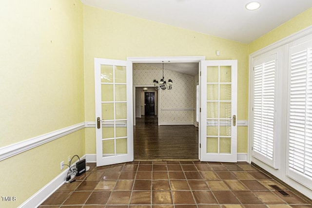 3112 Lake Pointe Trl, Rocky Mount, NC 27804 - unfurnished sunroom with vaulted ceiling, french doors, and a chandelier