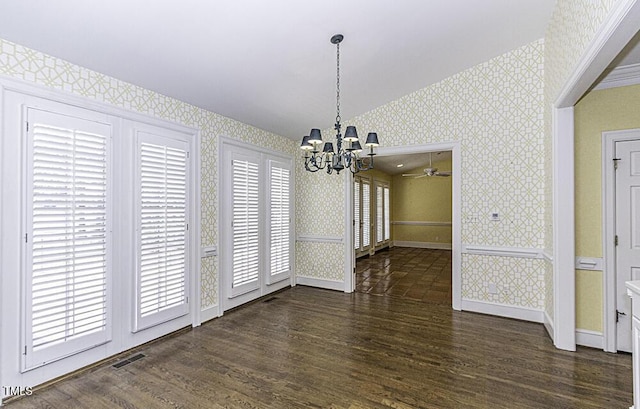 3112 Lake Pointe Trl, Rocky Mount, NC 27804 - unfurnished dining area featuring wallpapered walls, wood finished floors, and a chandelier