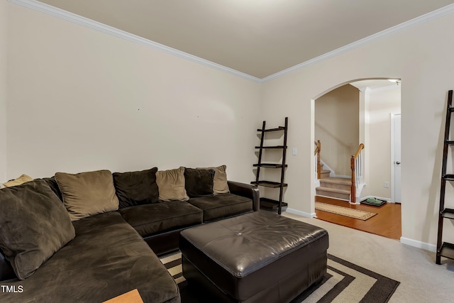316 Vintage Holly Dr, Durham, NC 27703 - living room featuring arched walkways, crown molding, and stairway