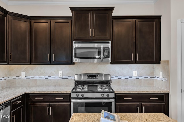 316 Vintage Holly Dr, Durham, NC 27703 - kitchen with stainless steel appliances, dark brown cabinets, tasteful backsplash, ornamental molding, and light stone counters