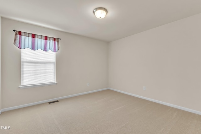 316 Vintage Holly Dr, Durham, NC 27703 - carpeted spare room with baseboards
