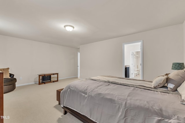 316 Vintage Holly Dr, Durham, NC 27703 - carpeted bedroom featuring baseboards and ensuite bath