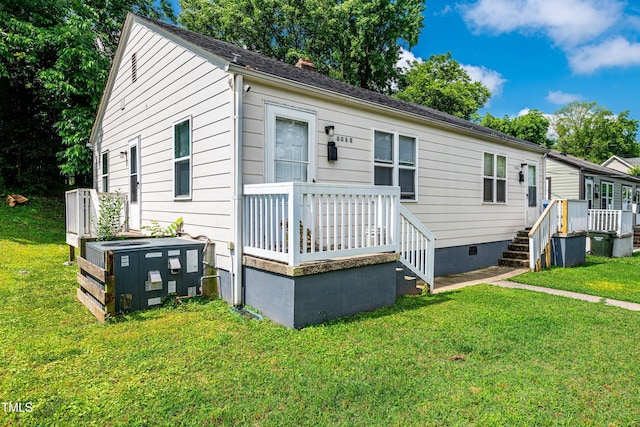 806 Eva St, Durham, NC 27701 - view of front facade featuring crawl space, a front lawn, and a deck
