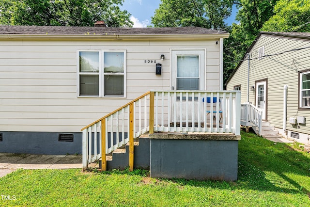 806 Eva St, Durham, NC 27701 - entrance to property featuring crawl space, a yard, and roof with shingles