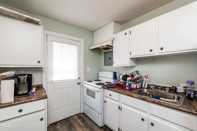806 Eva St, Durham, NC 27701 - kitchen featuring white electric range oven, under cabinet range hood, dark countertops, and dark wood finished floors