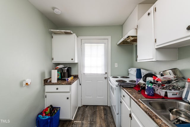 806 Eva St, Durham, NC 27701 - kitchen with electric range, under cabinet range hood, dark wood-style flooring, and white cabinetry