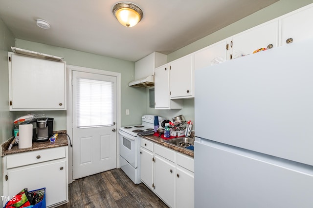 806 Eva St, Durham, NC 27701 - kitchen with white appliances, dark wood-style flooring, white cabinetry, under cabinet range hood, and dark countertops
