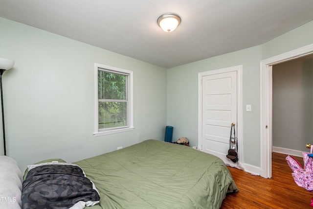 806 Eva St, Durham, NC 27701 - bedroom featuring wood finished floors and baseboards