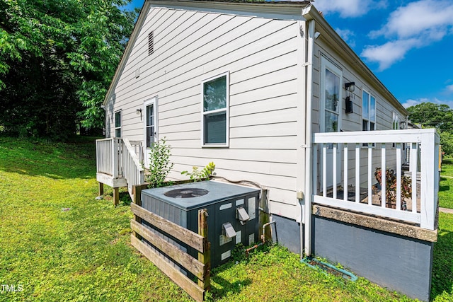 806 Eva St, Durham, NC 27701 - view of home's exterior with a yard and a wooden deck