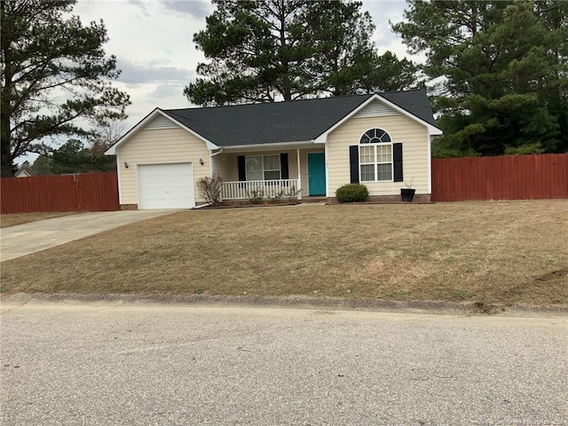 101 Horace Ct, Raeford, NC 28376 - ranch-style house featuring covered porch, concrete driveway, and an attached garage