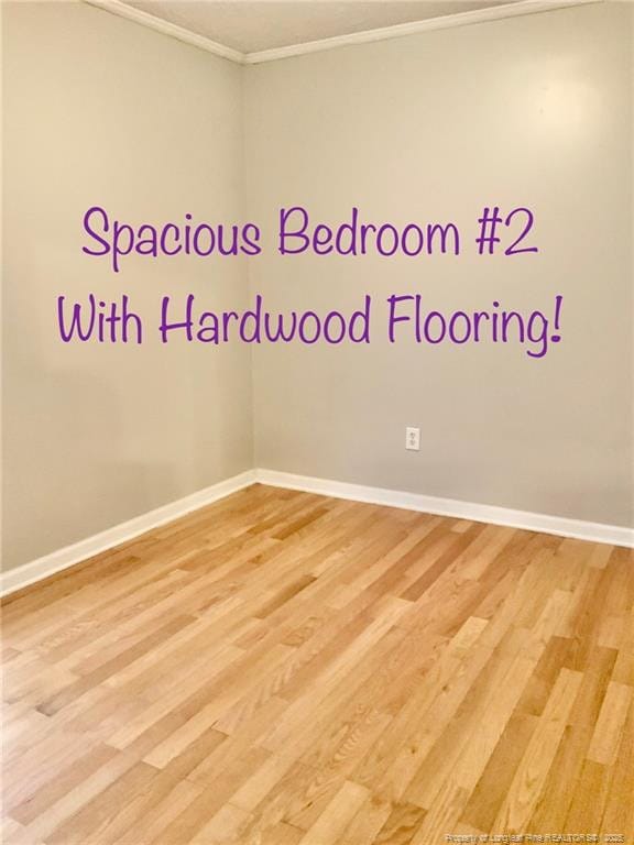 101 Horace Ct, Raeford, NC 28376 - unfurnished room with crown molding and light wood-type flooring