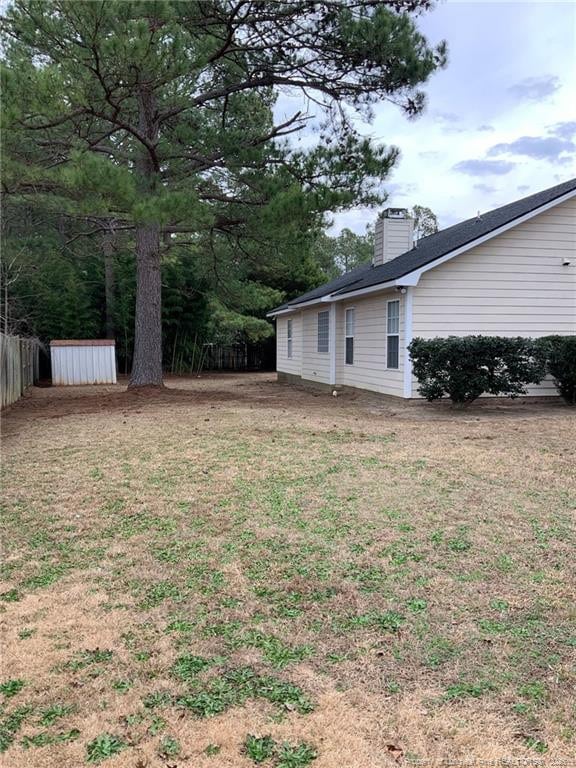 101 Horace Ct, Raeford, NC 28376 - view of yard with a storage shed