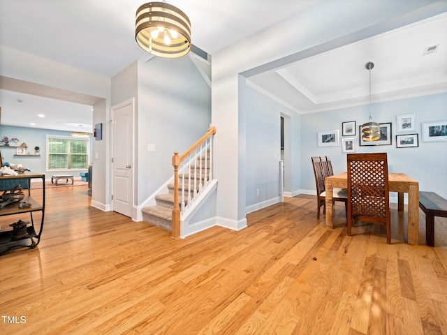 218 Inwood Forest Dr, Raleigh, NC 27603 - dining area with stairs and light wood-type flooring