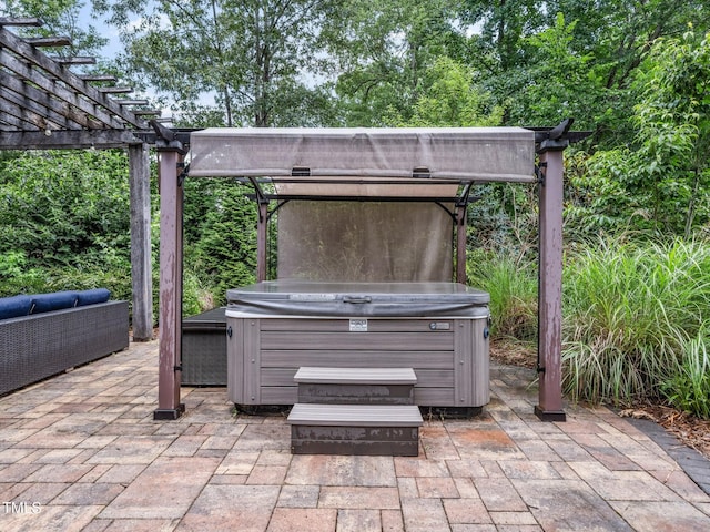218 Inwood Forest Dr, Raleigh, NC 27603 - view of patio / terrace featuring a hot tub and a pergola