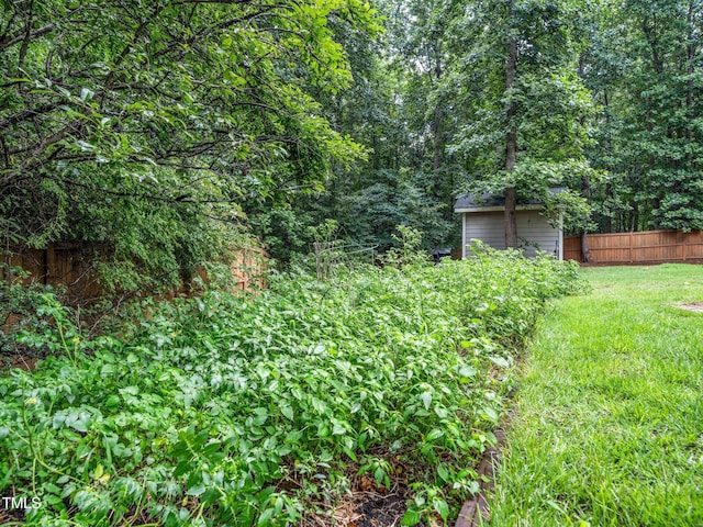 218 Inwood Forest Dr, Raleigh, NC 27603 - view of yard featuring a view of trees