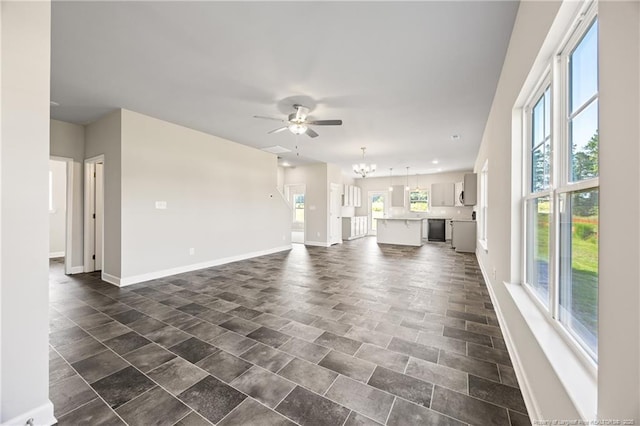 29 Red Bird Dr, Cameron, NC 28326 - unfurnished living room with ceiling fan and a chandelier
