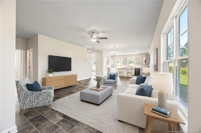 29 Red Bird Dr, Cameron, NC 28326 - living area with a ceiling fan and a chandelier