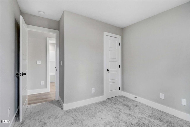 315 Byrd St, Clinton, NC 28328 - unfurnished bedroom with carpet flooring and baseboards