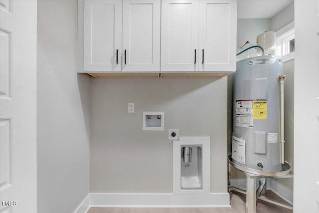 315 Byrd St, Clinton, NC 28328 - laundry area featuring electric water heater, hookup for an electric dryer, cabinet space, and washer hookup