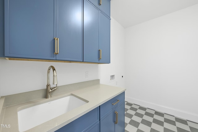 625 Glascock St, Raleigh, NC 27604 - kitchen featuring blue cabinets, tile patterned floors, and light countertops