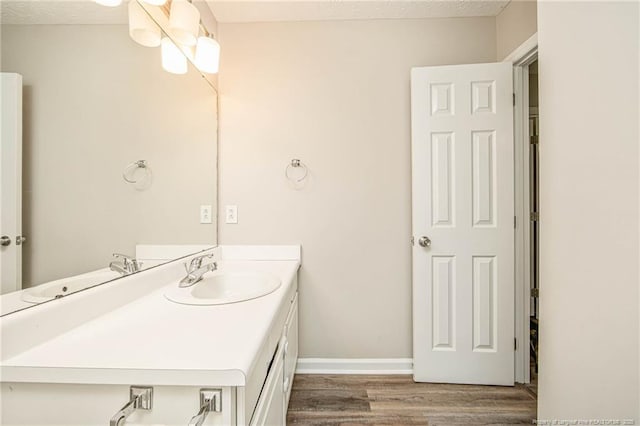 337 Buckeye Dr, Raeford, NC 28376 - bathroom featuring wood finished floors and vanity