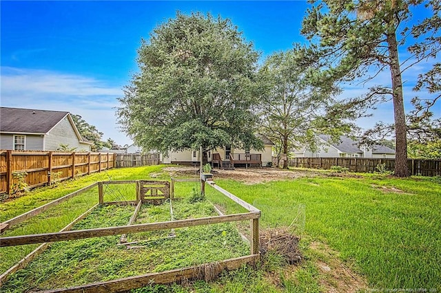 337 Buckeye Dr, Raeford, NC 28376 - fenced backyard with a garden