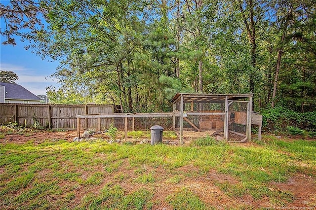 337 Buckeye Dr, Raeford, NC 28376 - view of yard featuring exterior structure and an outdoor structure