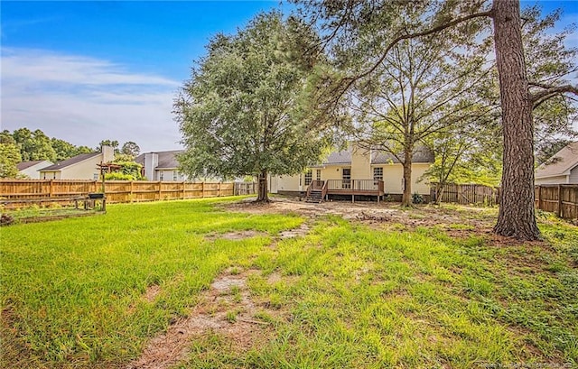 337 Buckeye Dr, Raeford, NC 28376 - fenced backyard with a wooden deck